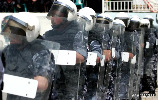 Palestinian Hamas security forces show their skills during a graduation ceremony at the Arafat police compound in Gaza City on May 10, 2011. Photo by Mohammed Othman