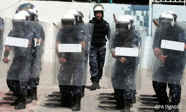 Palestinian Hamas security forces show their skills during a graduation ceremony at the Arafat police compound in Gaza City on May 10, 2011. Photo by Mohammed Othman