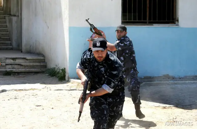 Palestinian Hamas security forces show their skills during a graduation ceremony at the Arafat police compound in Gaza City on May 10, 2011. Photo by Mohammed Othman