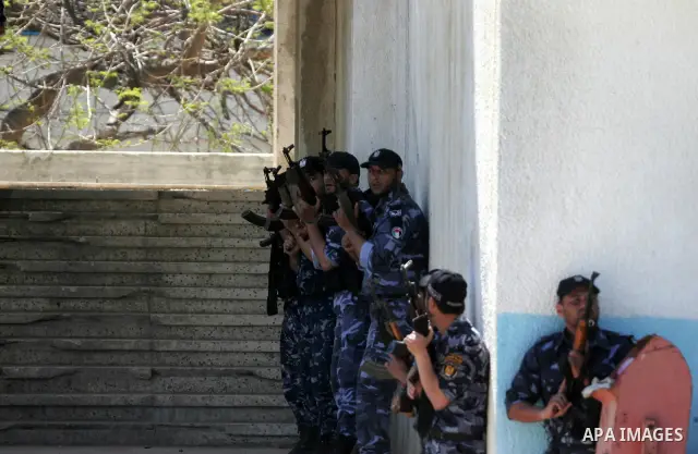 Palestinian Hamas security forces show their skills during a graduation ceremony at the Arafat police compound in Gaza City on May 10, 2011. Photo by Mohammed Othman