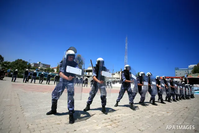 Palestinian Hamas security forces show their skills during a graduation ceremony at the Arafat police compound in Gaza City on May 10, 2011. Photo by Mohammed Othman