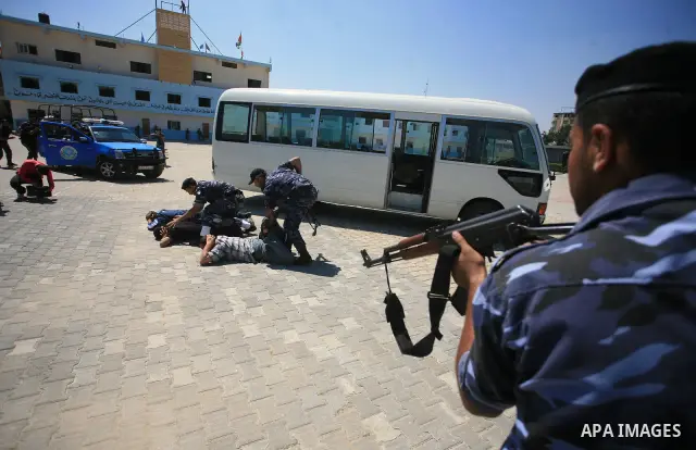 Palestinian Hamas security forces show their skills during a graduation ceremony at the Arafat police compound in Gaza City on May 10, 2011. Photo by Mohammed Othman