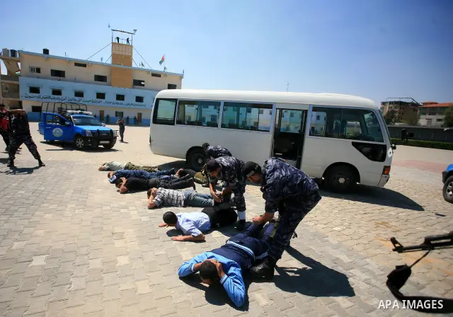 Palestinian Hamas security forces show their skills during a graduation ceremony at the Arafat police compound in Gaza City on May 10, 2011. Photo by Mohammed Othman