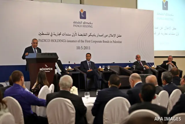 Palestinian Prime Minister, Salam Fayyad delivers speech during the ceremony to announce a new version of PADICO first commercial debenture in Palestine in the West Bank city of Ramallah on May 10, 2011. Photo by Mustafa...