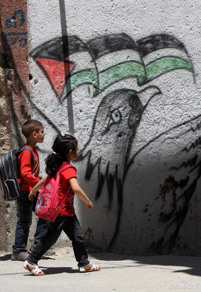 Palestinians children walk in a street in the West Bank Balata refugee camp, near Nablus on May 11, 2011, as Palestinians mark the 63rd anniversary of the "Nakba" (catastrophe). Nakba means "catastrophe" in reference to...