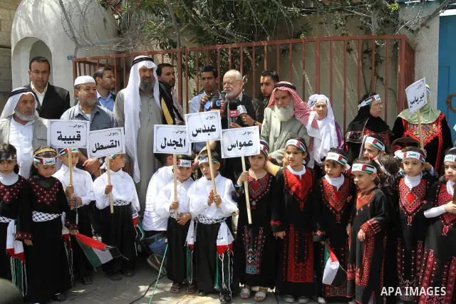 Palestinian children take part in a Nakba rally in Gaza City May 12, 2011. Palestinians will mark "Nakba" (Catastrophe) on May 15 to commemorate the time when hundreds of thousands of Palestinians were expelled or fled f...