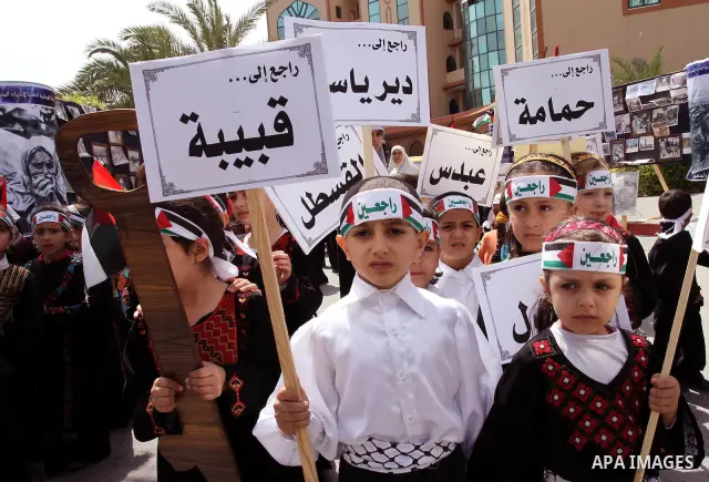 Palestinian children take part in a Nakba rally in Gaza City May 12, 2011. Palestinians will mark "Nakba" (Catastrophe) on May 15 to commemorate the time when hundreds of thousands of Palestinians were expelled or fled f...