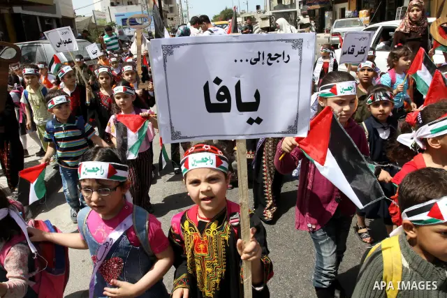 Palestinian children take part in a Nakba rally in Gaza City May 12, 2011. Palestinians will mark "Nakba" (Catastrophe) on May 15 to commemorate the time when hundreds of thousands of Palestinians were expelled or fled f...