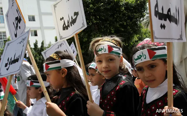 Palestinian children take part in a Nakba rally in Gaza City May 12, 2011. Palestinians will mark "Nakba" (Catastrophe) on May 15 to commemorate the time when hundreds of thousands of Palestinians were expelled or fled f...