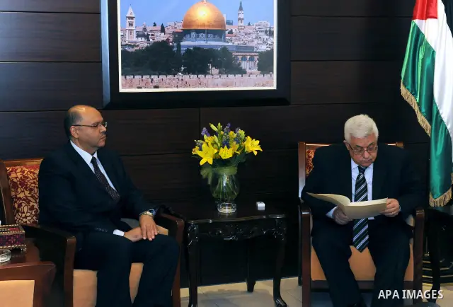 Palestinian President Mahmoud Abbas (Abu Mazen) during a meeting Egyptian Ambassador Yasser Osman in the West Bank city of Ramallah on May 12, 2011. Photo by Mohammed Atiq