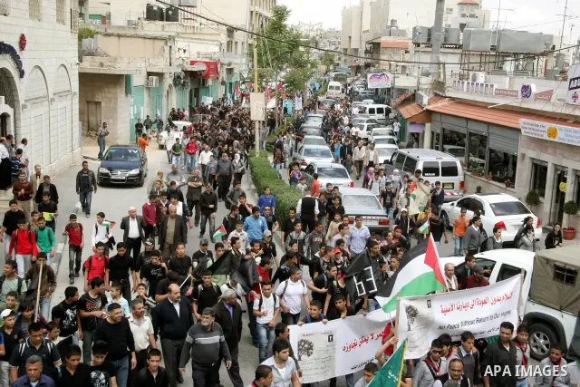 Palestinians take part in a demonstration to mark the 63th anniversary of "Nakba" (catastrophe), in the West Bank city of Bethlehem, on May 12, 2011. Nakba means "catastrophe" in reference to the birth of the state of Is...
