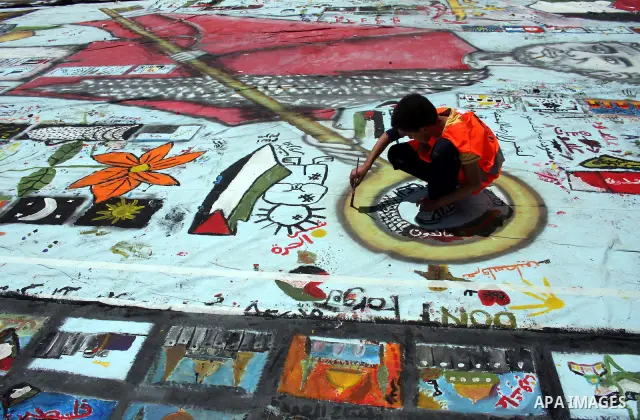 Palestinian students prepare a big mural to mark the 63th anniversary of "Nakba" (catastrophe), in the West Bank city of Ramallah, on May 12, 2011. Nakba means "catastrophe" in reference to the birth of the state of Isra...