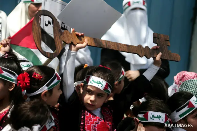 Palestinian children take part in a rally marking the 63rd anniversary of the 'Nakba', or 'Catastrophe', in Gaza City, Thursday, May 12, 2011. Hundreds of thousands of Palestinians were uprooted in the 1948 war that led...
