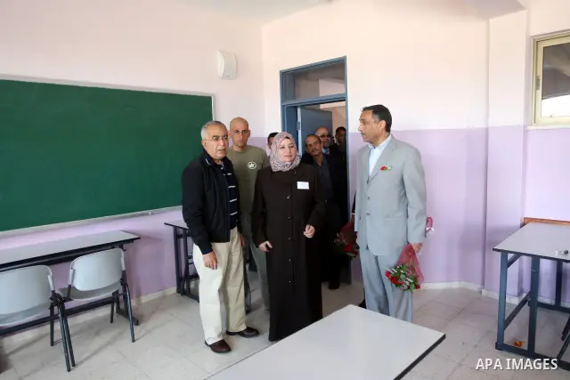 Palestinian Prime Minister, Salam Fayyad attends the celebration of completion of Nahalin secondary school for girls in the West Bank city of Bethlehem on May 12,2011. Photo by Mustafa Abu Dayeh