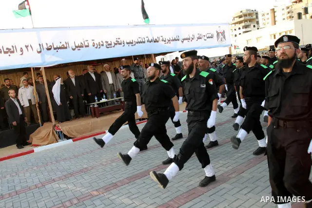 Palestinian Hamas security forces march during a graduation ceremony at the Ansar police compound in Gaza City on May 12, 2011. Photo by Mohammed Asad