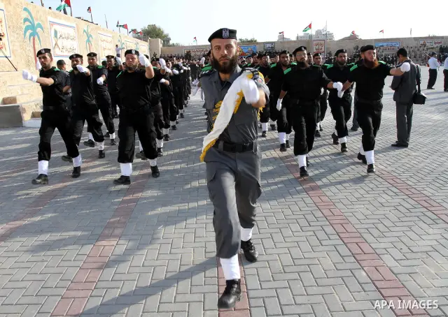 Palestinian Hamas security forces march during a graduation ceremony at the Ansar police compound in Gaza City on May 12, 2011. Photo by Mohammed Asad
