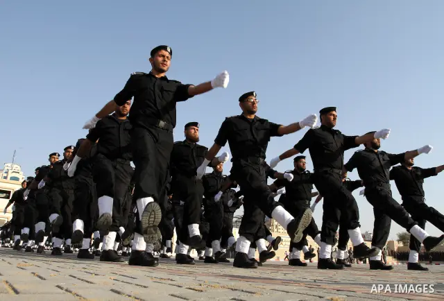 Palestinian Hamas security forces march during a graduation ceremony at the Ansar police compound in Gaza City on May 12, 2011. Photo by Mohammed Asad