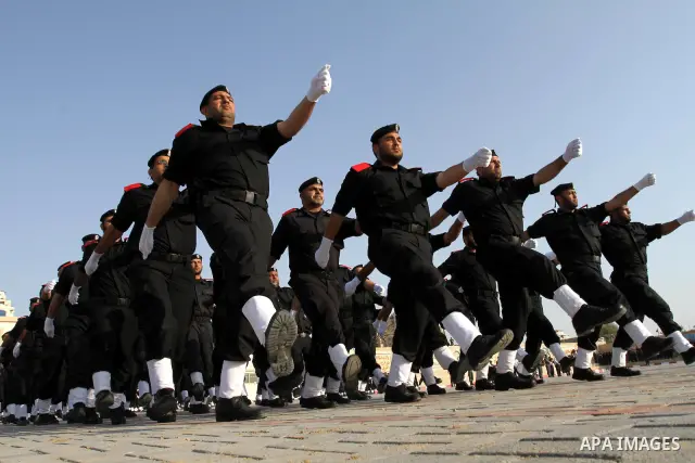 Palestinian Hamas security forces march during a graduation ceremony at the Ansar police compound in Gaza City on May 12, 2011. Photo by Mohammed Asad