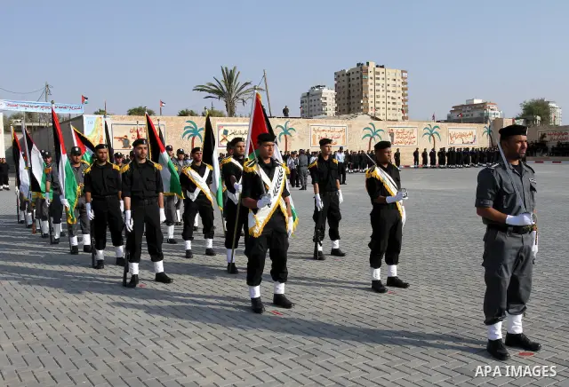 Palestinian Hamas security forces stand at attention during a graduation ceremony at the Ansar police compound in Gaza City on May 12, 2011. Photo by Mohammed Asad