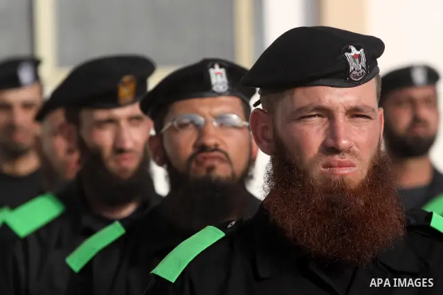 Palestinian Hamas security forces stand at attention during a graduation ceremony at the Ansar police compound in Gaza City on May 12, 2011. Photo by Mohammed Asad