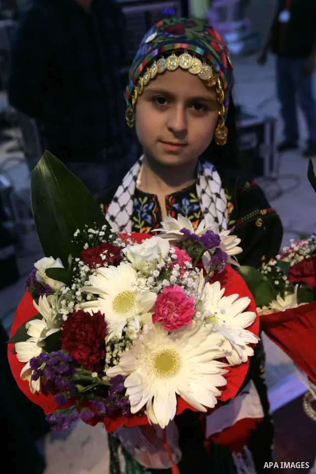 Palestinian brides and grooms take part in a mass wedding ceremony for disabled couples in the West Bank city of Nablus, Thursday, May 12, 2011. The wedding was sponsored by the United Arab Emirates and the Fatah movemen...