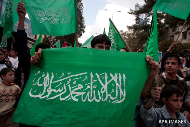 Palestinian supporters of Hamas Islamist movement attend a rally to mark the 63th anniversary of "Nakba" (catastrophe) on May 13, 2011 in the West Bank city of Hebron. Nakba means "catastrophe" in reference to the birth...