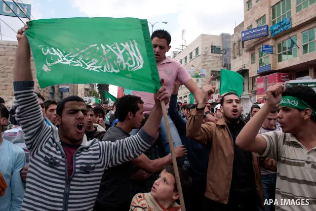 Palestinian supporters of Hamas Islamist movement attend a rally to mark the 63th anniversary of "Nakba" (catastrophe) on May 13, 2011 in the West Bank city of Hebron. Nakba means "catastrophe" in reference to the birth...