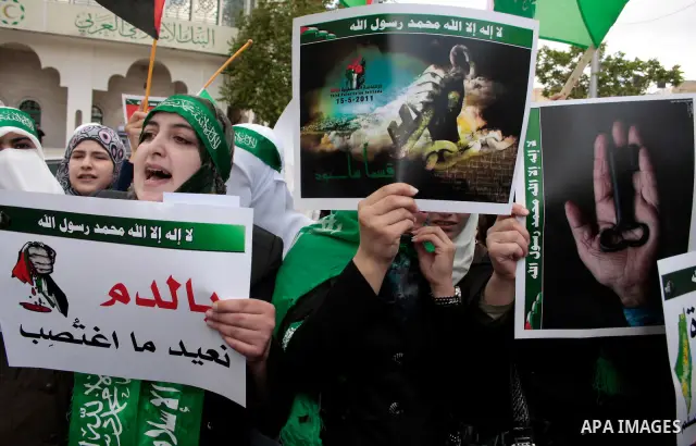 Palestinian supporters of Hamas Islamist movement attend a rally to mark the 63th anniversary of "Nakba" (catastrophe) on May 13, 2011 in the West Bank city of Hebron. Nakba means "catastrophe" in reference to the birth...