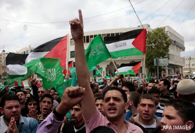 Palestinian supporters of Hamas Islamist movement attend a rally to mark the 63th anniversary of "Nakba" (catastrophe) on May 13, 2011 in the West Bank city of Hebron. Nakba means "catastrophe" in reference to the birth...