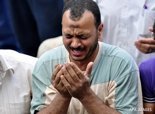 Egyptians attend Friday prayers at a rally at Cairo's Tahrir Square on May 13, 2011 during a protest calling for national unity after attacks on Egyptian churches, and solidarity with the Palestinians as they mark the "N...