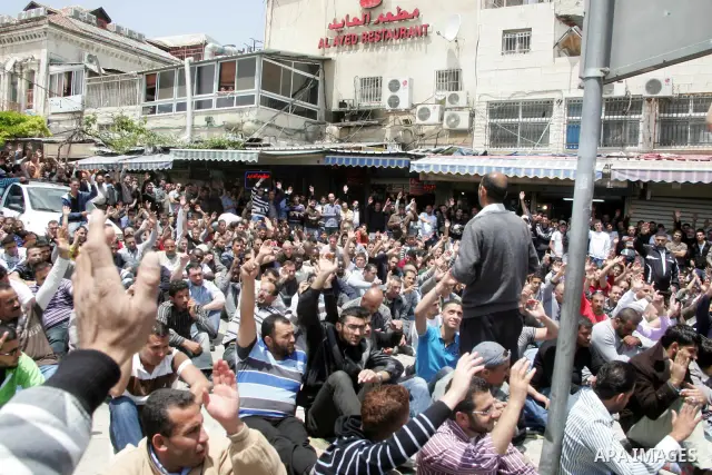 Palestinian Muslim worshipers perform Friday prayer outside Jerusalem's Old City on May 13, 2011 as Israeli police flooded the streets of Jerusalem, fearing violence as Palestinians began marking the "Nakba" or "catastro...