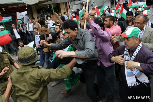 Palestinians Artists take part in a demonstration to mark the 63th anniversary of "Nakba" (catastrophe), in Gaza city, on May 14, 2011. Through the display of theatrical sketch. Nakba means "catastrophe" in reference to...