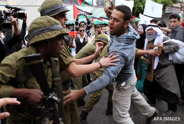 Palestinians Artists take part in a demonstration to mark the 63th anniversary of "Nakba" (catastrophe), in Gaza city, on May 14, 2011. Through the display of theatrical sketch. Nakba means "catastrophe" in reference to...
