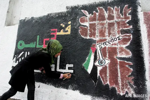 Palestinian Artists take part in paint a murals to mark the 63th anniversary of "Nakba" (catastrophe), in Gaza City, on May 14, 2011. Hundreds of thousands of Palestinians were uprooted in the 1948 war that led to Israel...