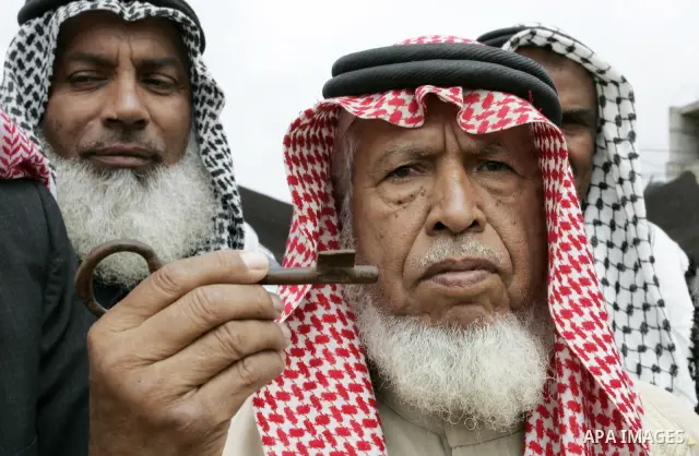 Palestinian men gather at the "Camp of Return" tent to stress the refugees' ties to their ancestral land on May 14, 2011 in the southern Gaza Strip refugee camp of Rafah, where Palestinians are marking the 63rd anniversa...