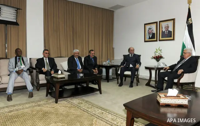 Palestinian President Mahmoud Abbas (Abu Mazen) meets with the head of International Federation of Sports Media in the West Bank city of Ramallah on May 14, 2011. Photo by Thaer Ganaim