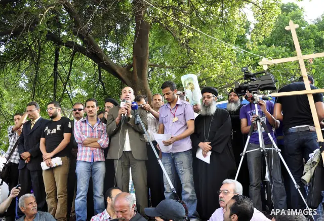 Egyptian Coptic Christians protest in front of the state television building in Cairo on May 14, 2011 against recent attempts to trigger sectarian conflict in the country. Photo by Ahmed Asad