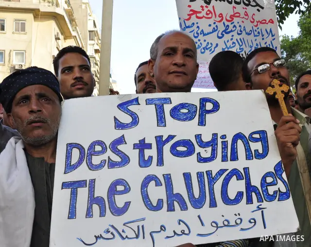 Egyptian Coptic Christians protest in front of the state television building in Cairo on May 14, 2011 against recent attempts to trigger sectarian conflict in the country. Photo by Ahmed Asad