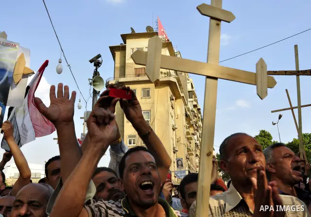 Egyptian Coptic Christians protest in front of the state television building in Cairo on May 14, 2011 against recent attempts to trigger sectarian conflict in the country. Photo by Ahmed Asad