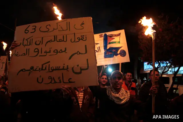 Palestinians take part in a demonstration to mark the 63th anniversary of "Nakba" (catastrophe), in the West Bank city of Hebron on May 14, 2011. to mark the 63rd anniversary of al-Nakba Day when Israeli forces had ouste...
