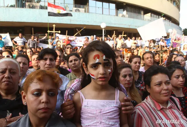 Egyptian Coptic Christians protest in front of the state television building in Cairo on May 14, 2011 against recent attempts to trigger sectarian conflict in the country. Photo by Ashraf Amra