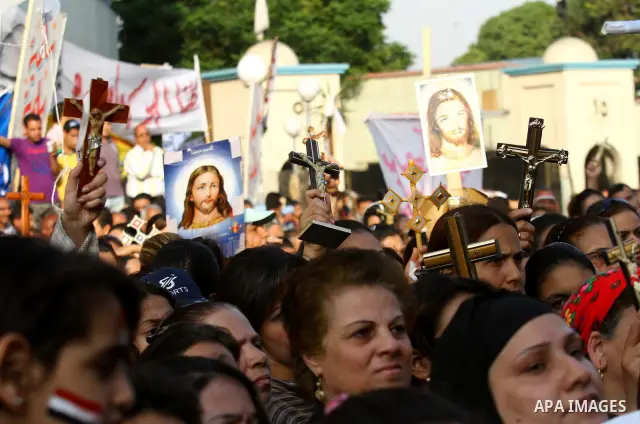 Egyptian Coptic Christians protest in front of the state television building in Cairo on May 14, 2011 against recent attempts to trigger sectarian conflict in the country. Photo by Ashraf Amra