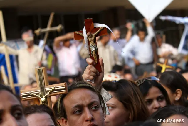 Egyptian Coptic Christians protest in front of the state television building in Cairo on May 14, 2011 against recent attempts to trigger sectarian conflict in the country. Photo by Ashraf Amra