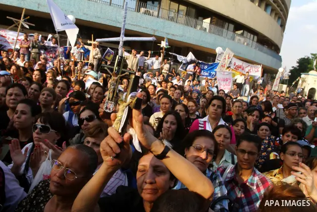 Egyptian Coptic Christians protest in front of the state television building in Cairo on May 14, 2011 against recent attempts to trigger sectarian conflict in the country. Photo by Ashraf Amra