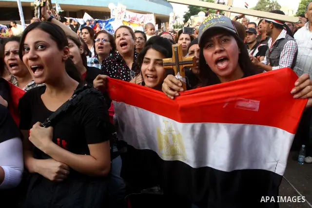 Egyptian Coptic Christians protest in front of the state television building in Cairo on May 14, 2011 against recent attempts to trigger sectarian conflict in the country. Photo by Ashraf Amra