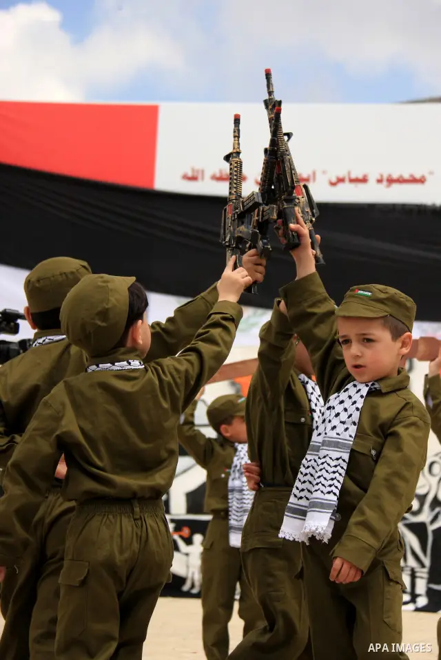 Palestinian children, some of them holding symbolic keys representing the keys to their homes snatched when the state of Israel was created, attend a rally to mark the day of "nakba" or the catastrophe on May 15, 2011 in...