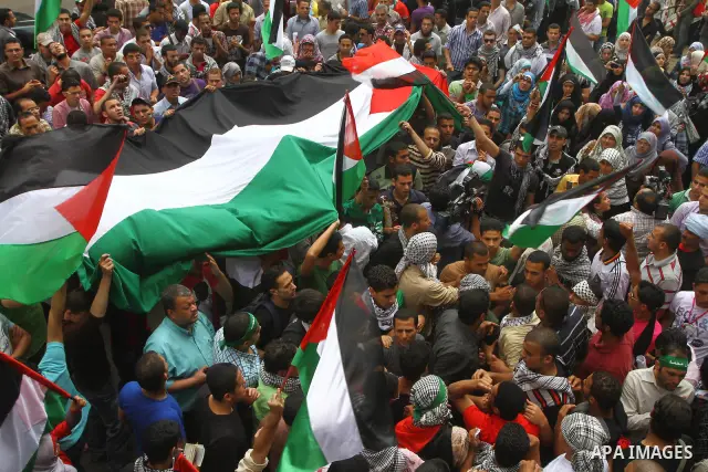 Egyptian protesters take part in a protest in front of the Israeli embassy in Cairo on May 15, 2011 in solidarity with Palestinians who mourned the "nakbah" anniversary of Israel's creation in 1948, as a result of which...