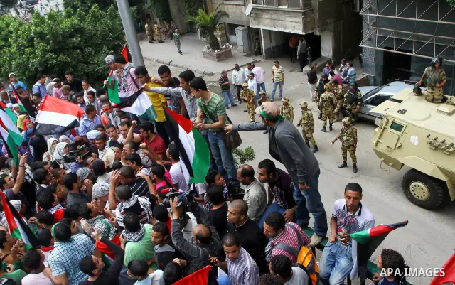 Egyptian protesters take part in a protest in front of the Israeli embassy in Cairo on May 15, 2011 in solidarity with Palestinians who mourned the "nakbah" anniversary of Israel's creation in 1948, as a result of which...