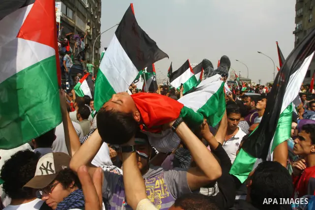 Egyptian protesters take part in a protest in front of the Israeli embassy in Cairo on May 15, 2011 in solidarity with Palestinians who mourned the "nakbah" anniversary of Israel's creation in 1948, as a result of which...