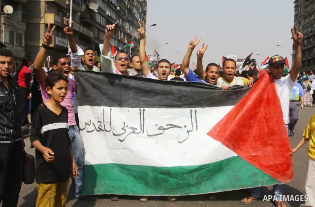 Egyptian protesters take part in a protest in front of the Israeli embassy in Cairo on May 15, 2011 in solidarity with Palestinians who mourned the "nakbah" anniversary of Israel's creation in 1948, as a result of which...